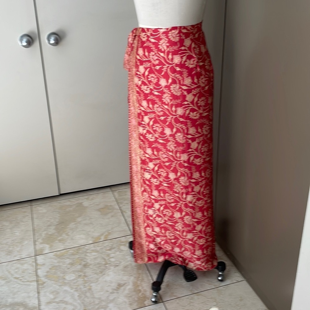 Silk sarong in a pouch handmade in Indonesia.